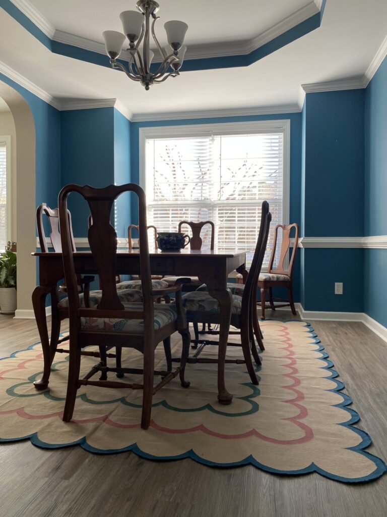 Scalloped dhurrie dining room rug